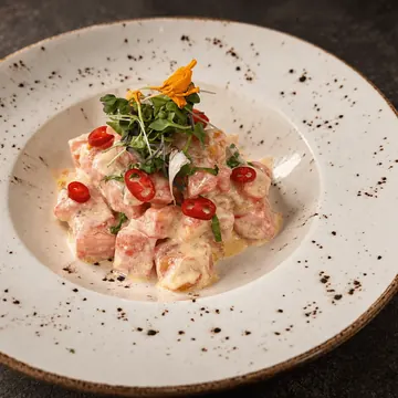 Ensalada de tomate rosa de Barbastro con crema de queso de Tronchón